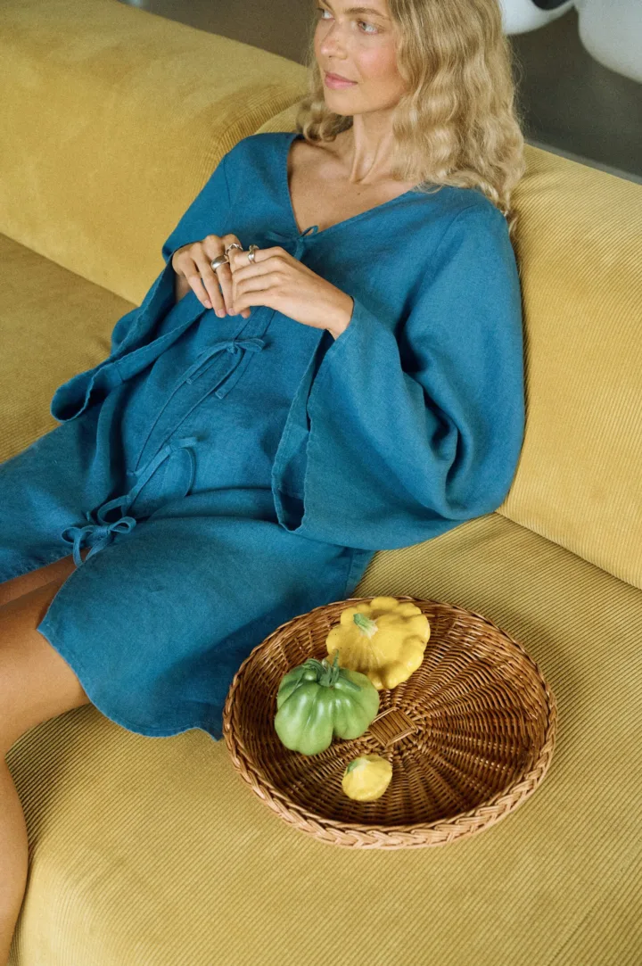 Stellar blue Luise dress, an oversized linen mini dress with breezy sleeves and front ties