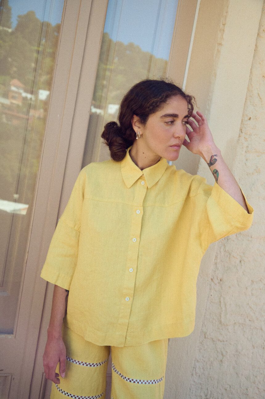 Oversized linen shirt with relaxed fit and button front
