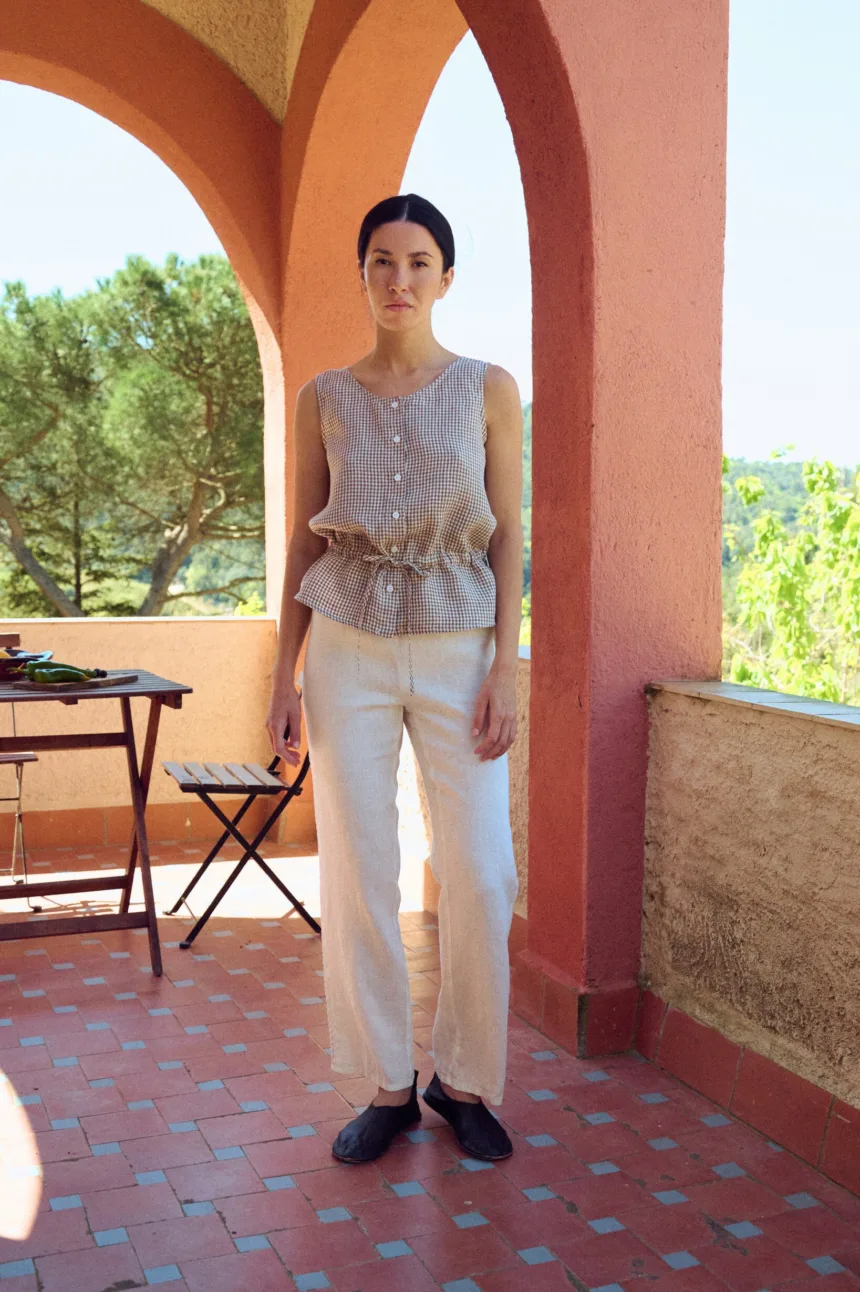 White linen drawstring pants with straight leg and lace detail