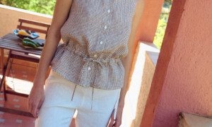Gingham sleeveless top with button front and drawstring waist