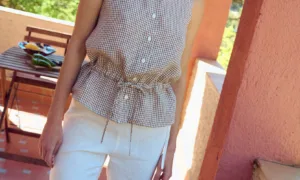 Gingham sleeveless top with button front and drawstring waist