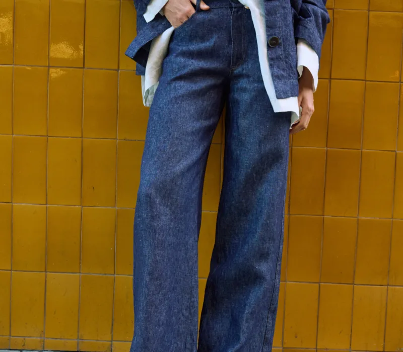 Blue denim linen jeans with wide legs and front pockets, styled with a matching linen jacket and white linen shirt