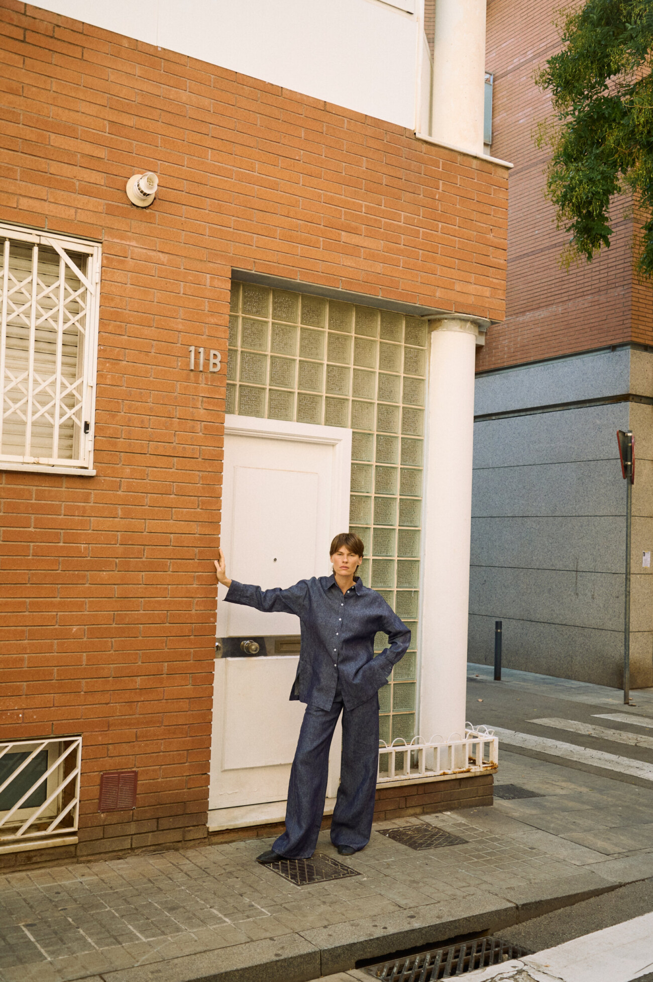 Blue denim linen pants with wide legs, styled with a matching button-down linen shirt