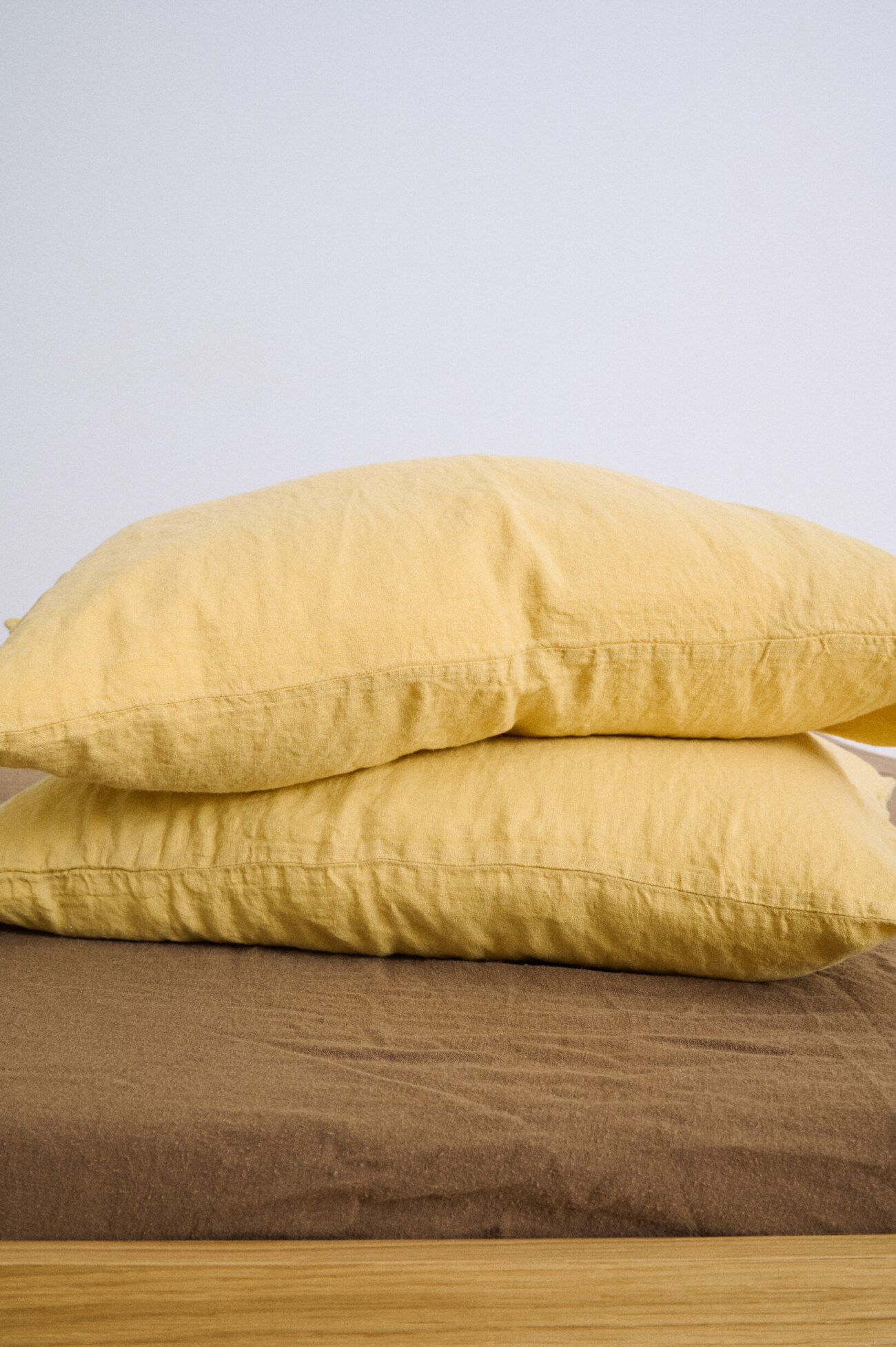 Butter yellow linen pillowcase with envelope closure