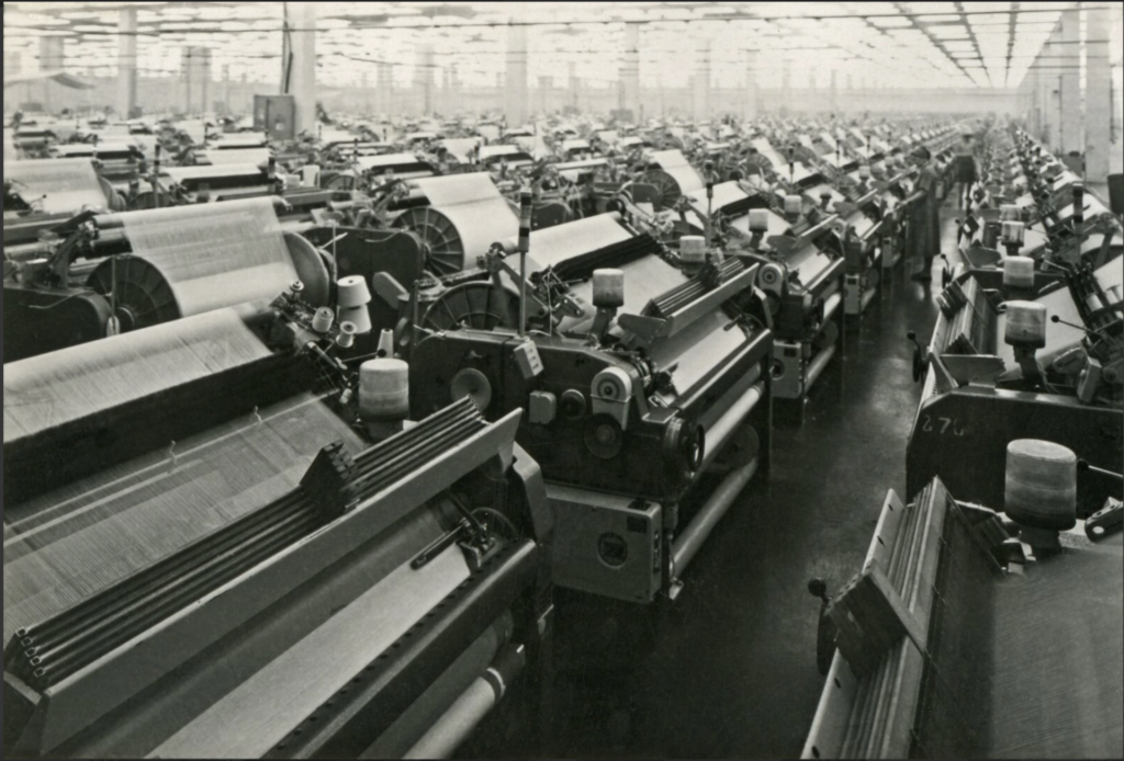 Industrial looms weaving linen in a Lithuanian factory